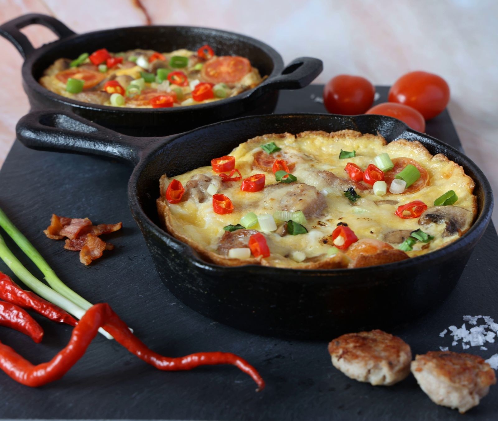 Christmas breakfast casseroles: vegetable egg bake in a cast iron skillet