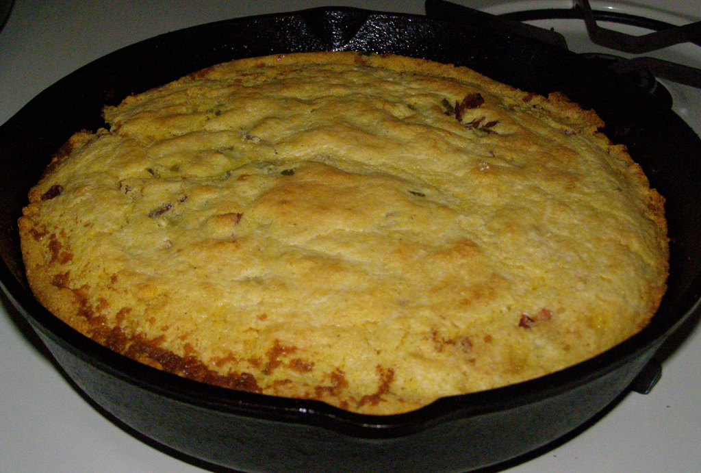 Cracklin bread baked golden brown in a cast iron skillet