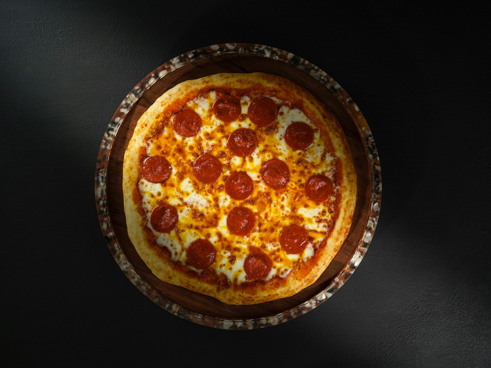 Pepperoni pizza ready for a hot honey drizzle