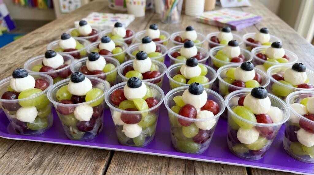 Monster eyeball cups with grapes, mozzarella and blueberries