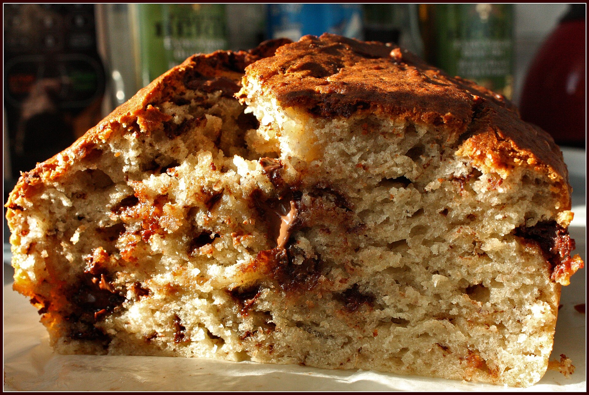Sliced banana chocolate chip bread with a tender crumb