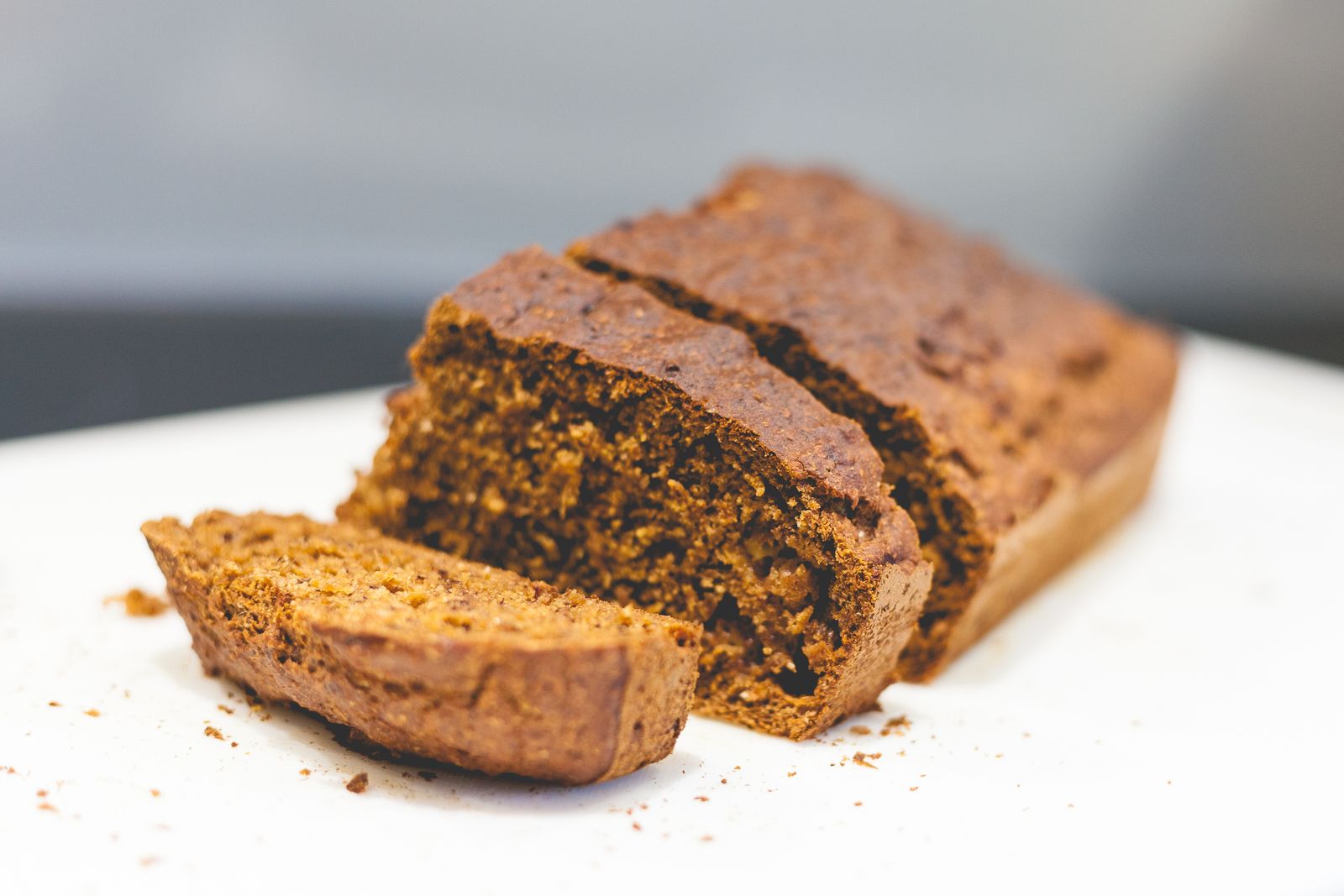 Sliced loaf of spiced sweet potato bread, one of the coziest holiday baking gifts