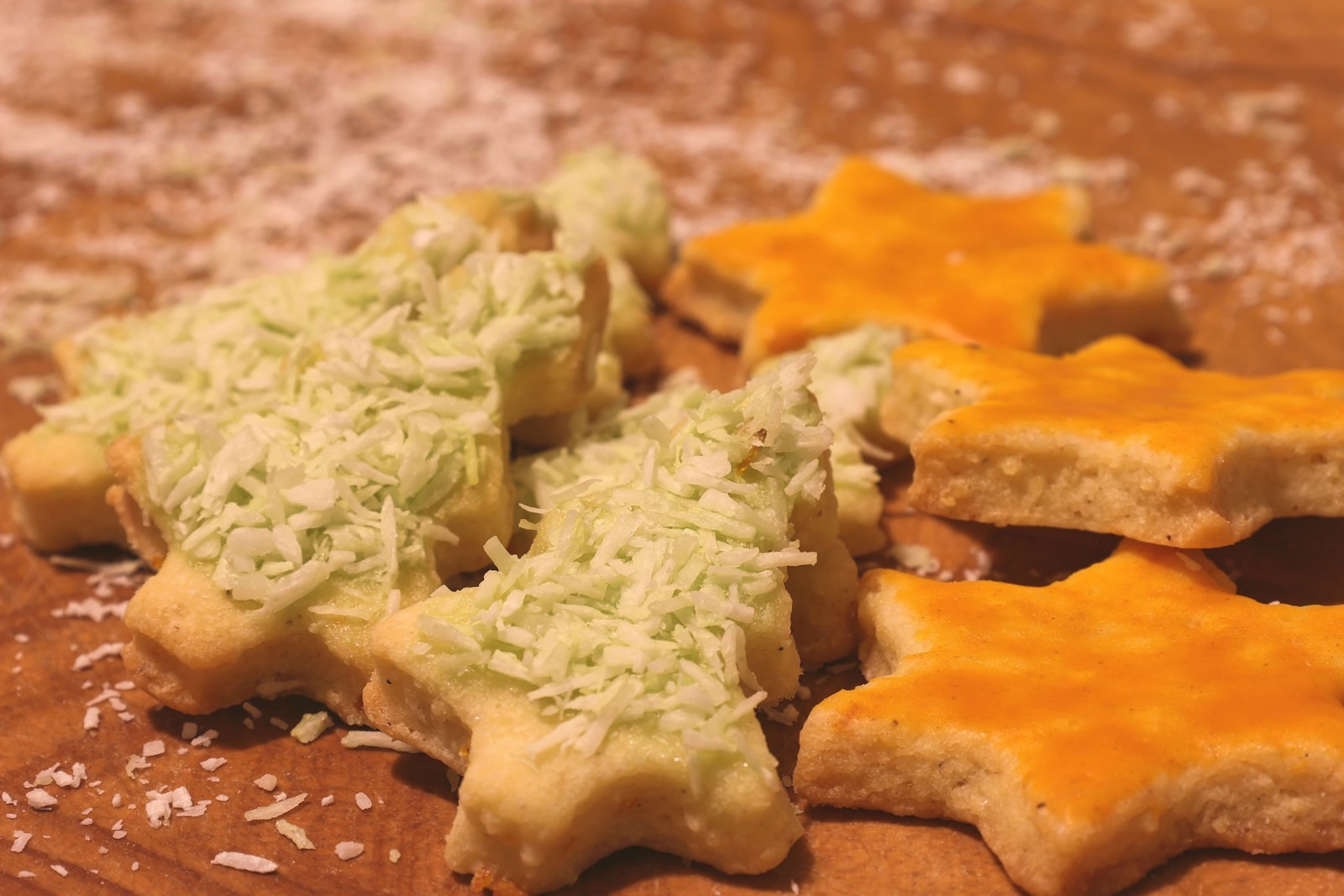 Parmesan puff pastry trees and stars on a baking board