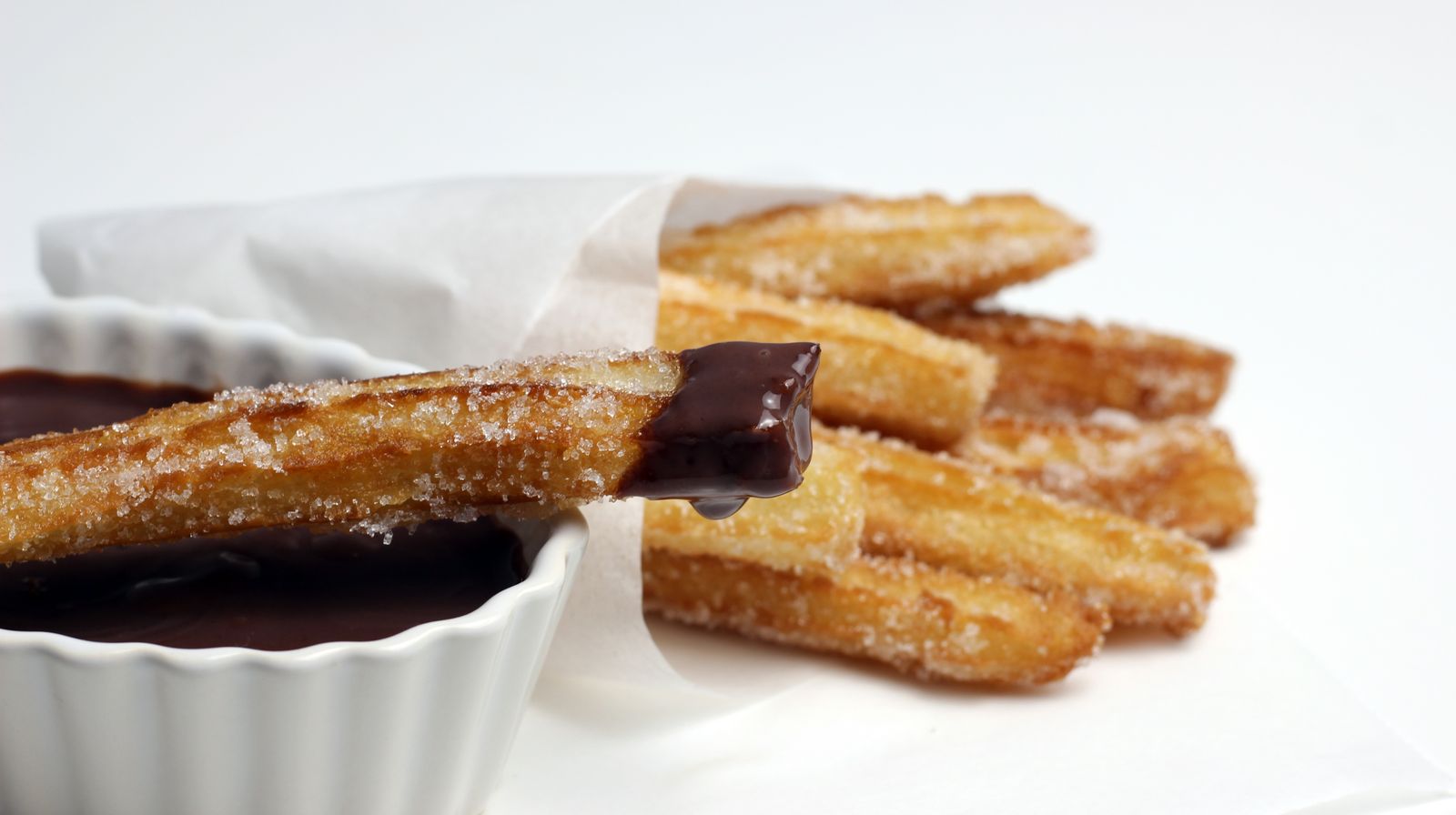 Sugar churros with chocolate dip, a sweet ending to retro Disney recipes
