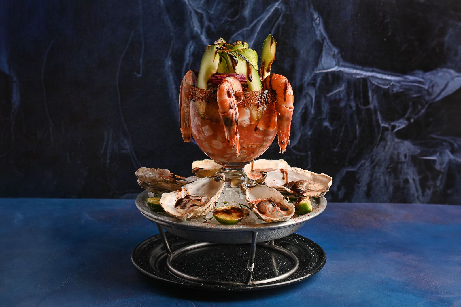 Shrimp cocktail and oysters on ice, oyster bar style