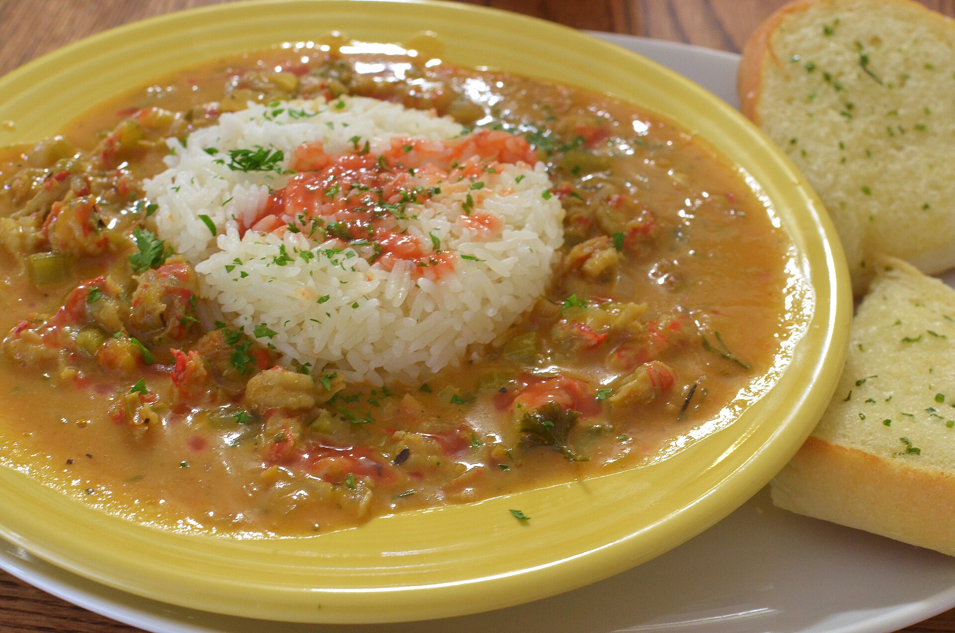 Crawfish etouffee over rice, a New Orleans pick from Emeril Lagasse recipes