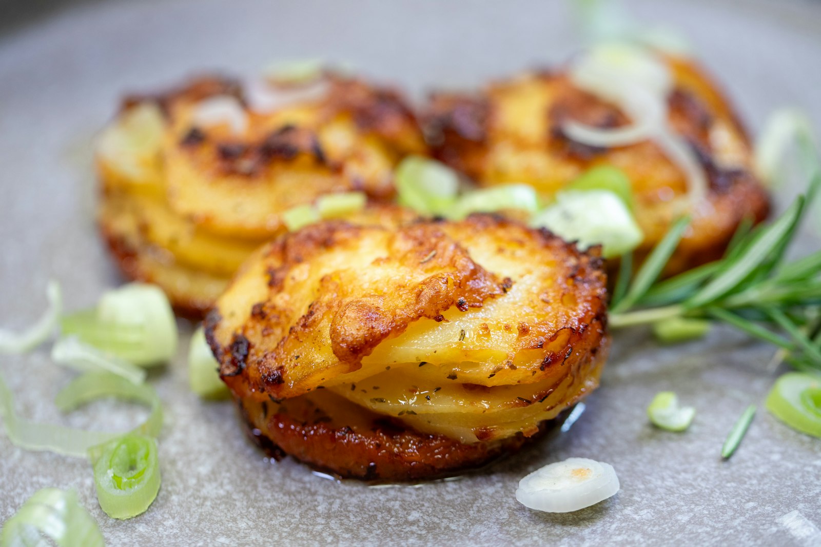 Golden layered gratin with cheese