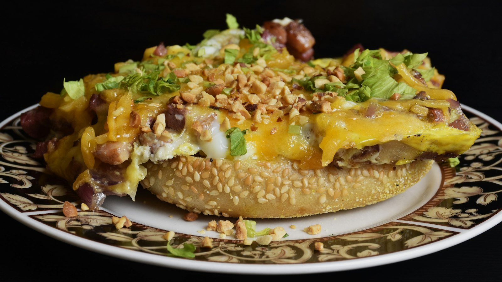 Loaded baked potato with sliced steak and cheese
