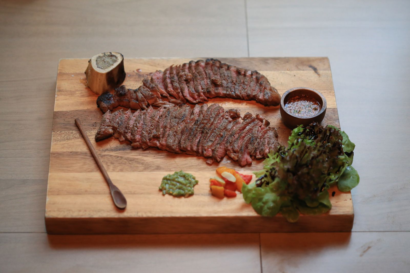 Sliced roast beef on a cutting board