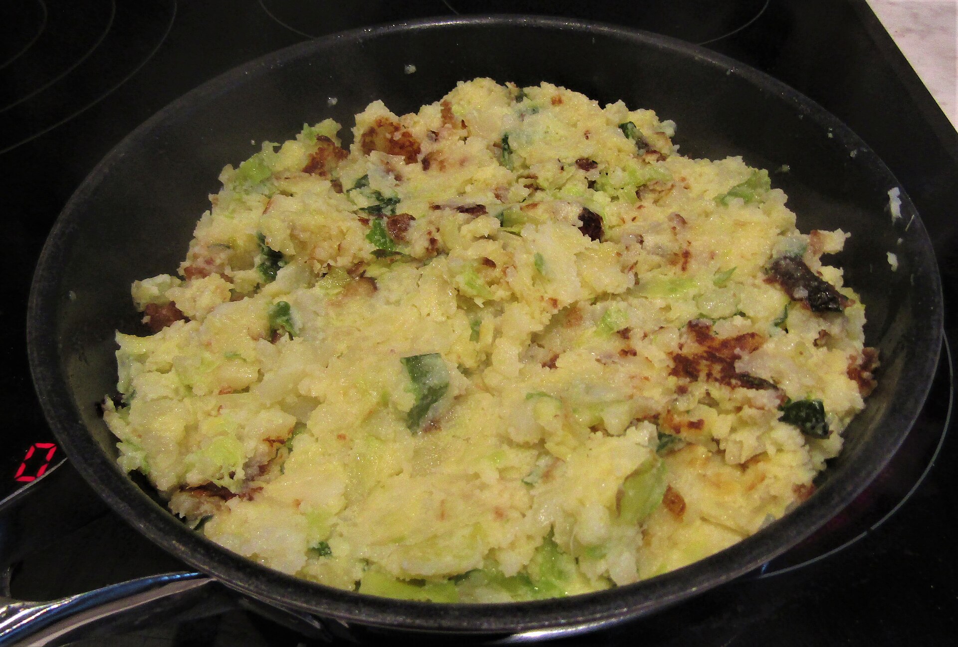 Bubble and squeak frying in a pan, a Jamie Oliver Christmas leftovers idea