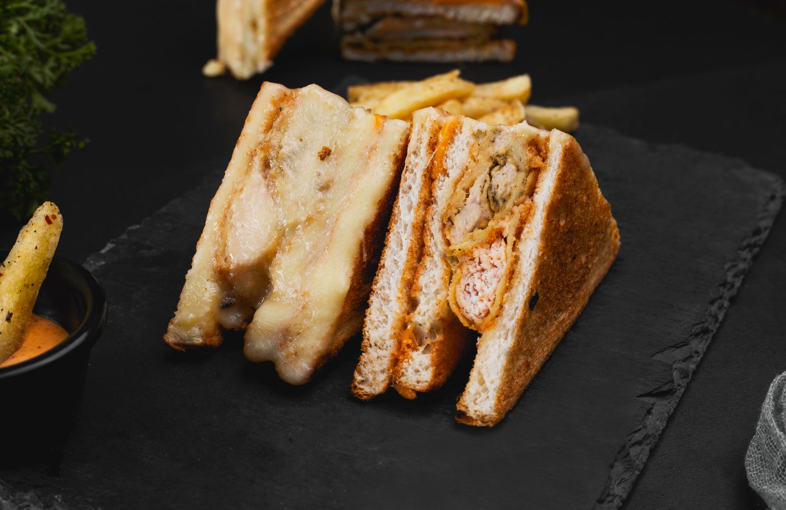 Toasted leftover turkey sandwiches with a dip