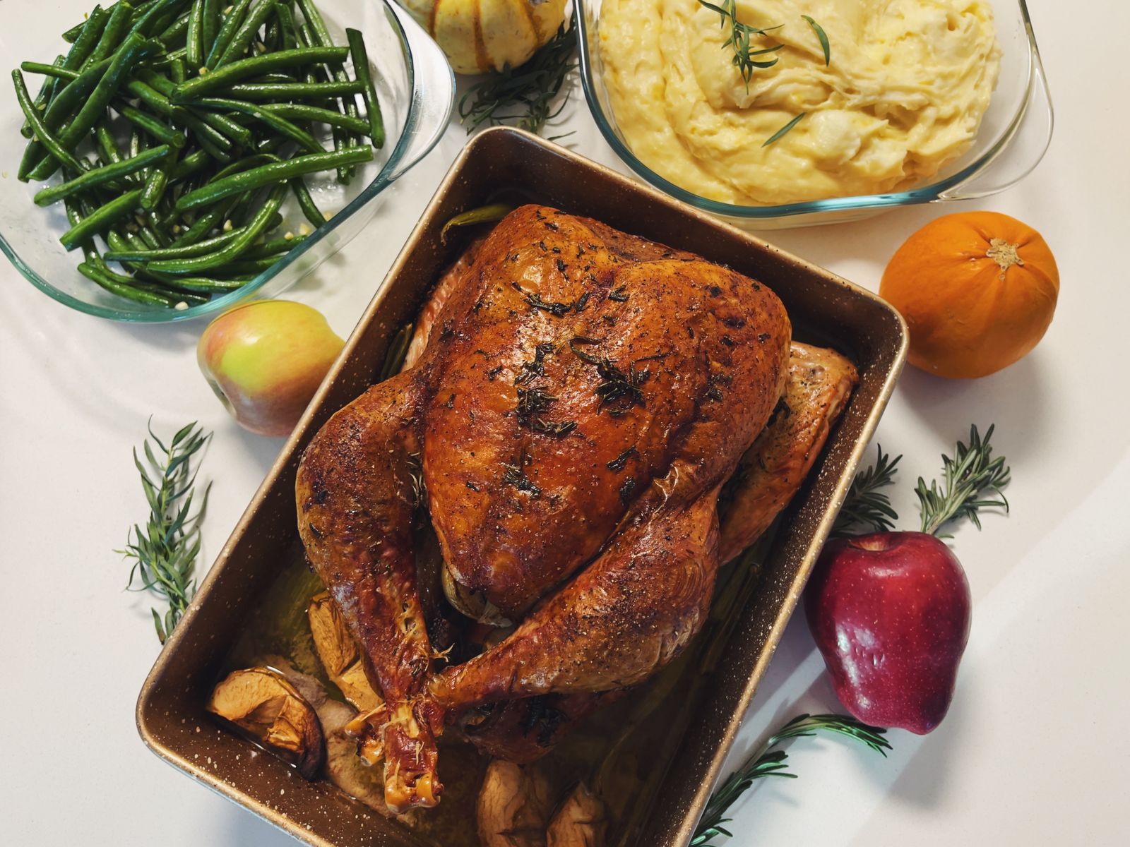 Golden roast turkey on a holiday table, the star of a Jamie Oliver Christmas dinner