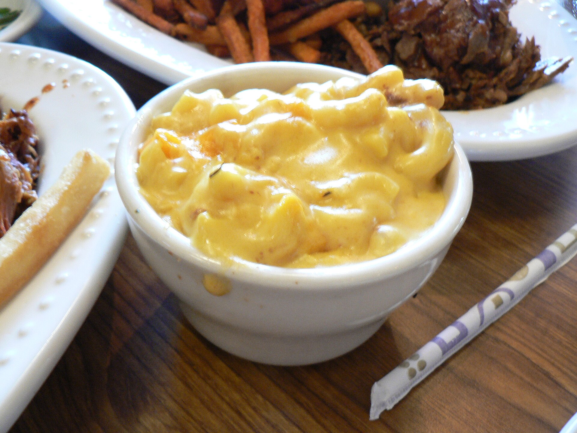 Bowl of creamy macaroni and cheese, the side Travis picks at a Kelce Thanksgiving