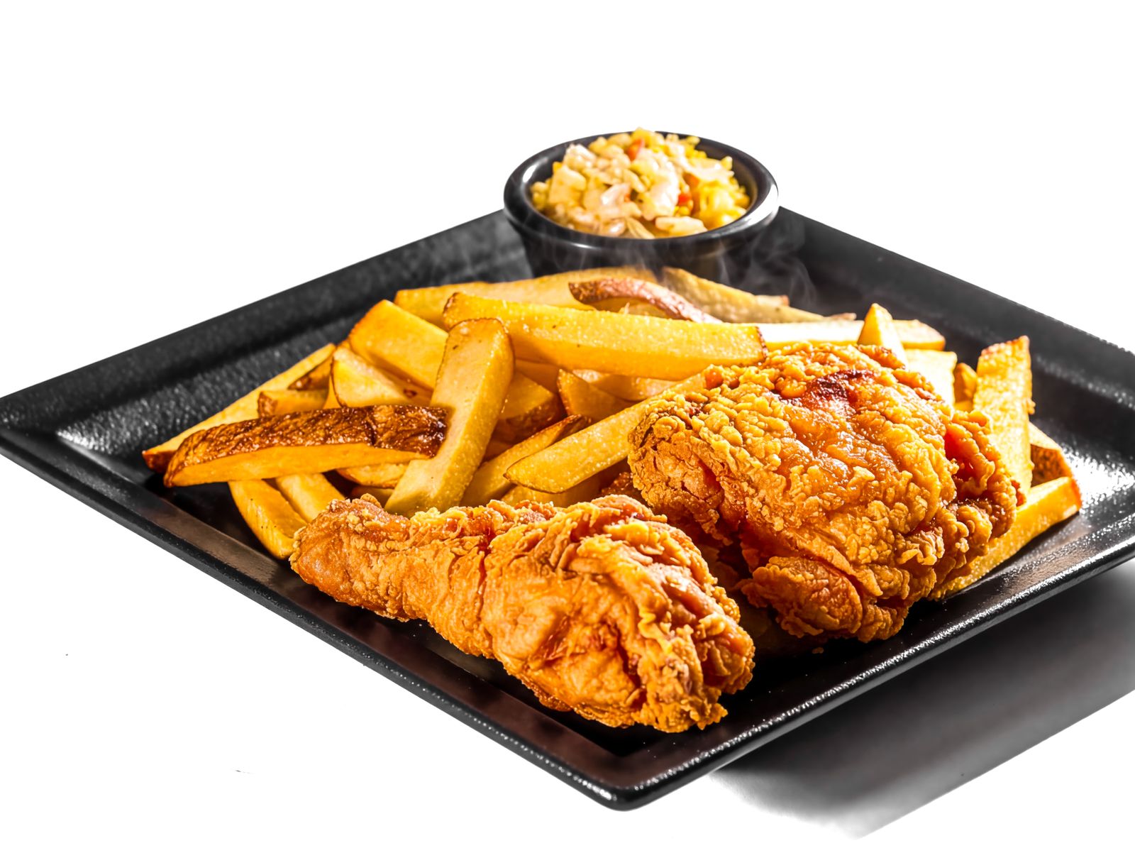 Crispy Southern fried chicken with fries and coleslaw