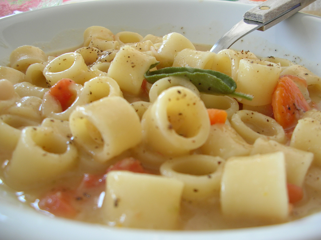 Bowl of classic pasta e fagioli with small pasta and beans