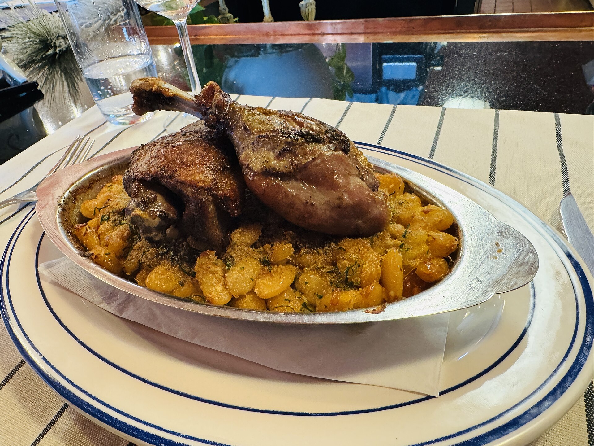 Bowl of cassoulet with white beans and meat, a cozy pick from Jacques Pepin recipes