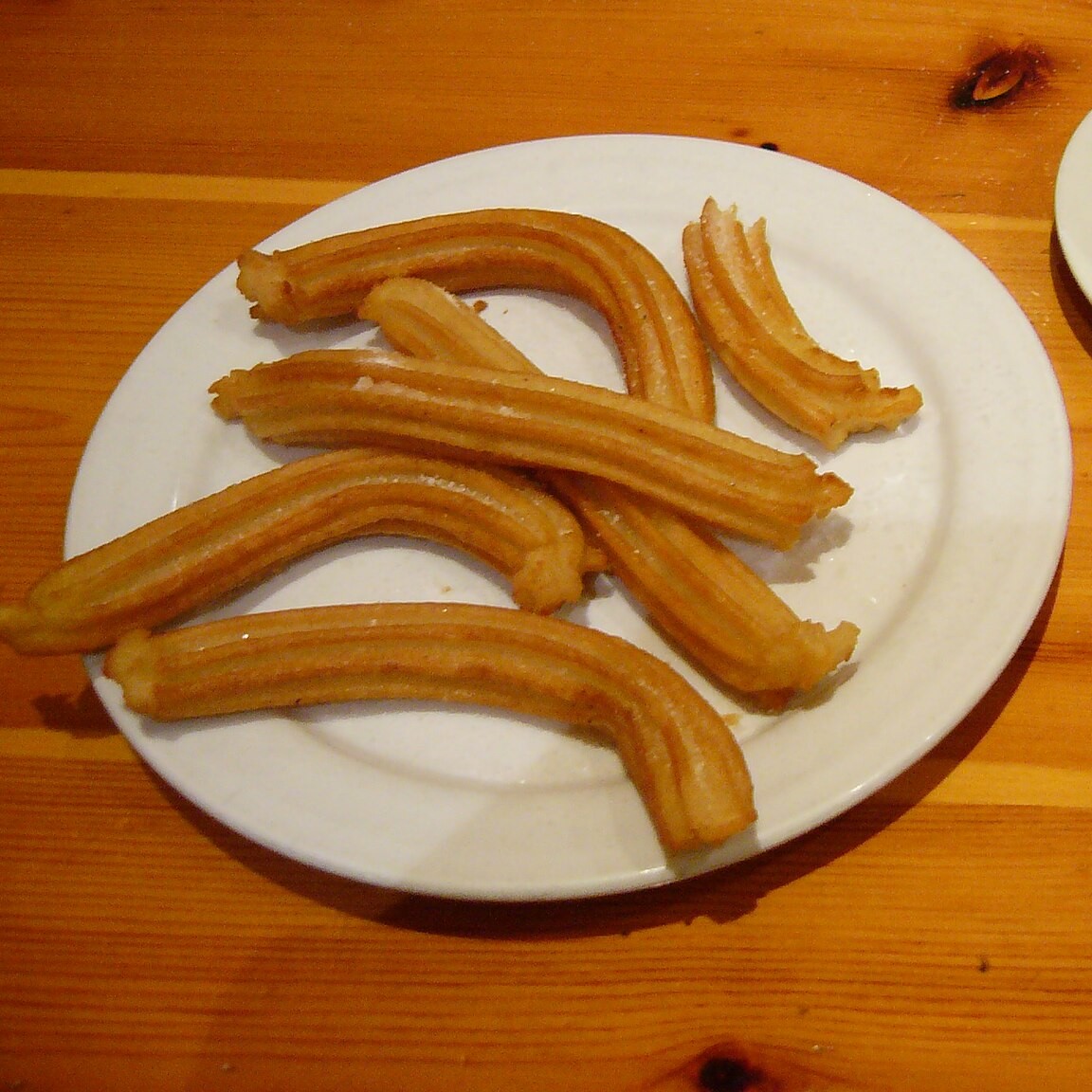 Plate of Spanish churros for dipping in chocolate