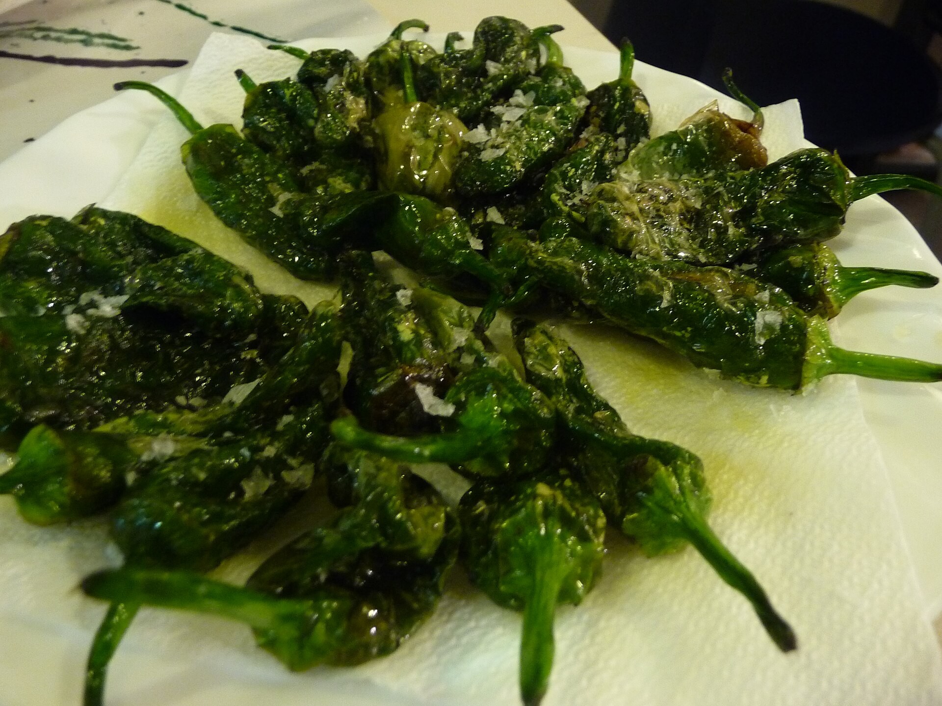 Blistered Padrón peppers with flaky salt