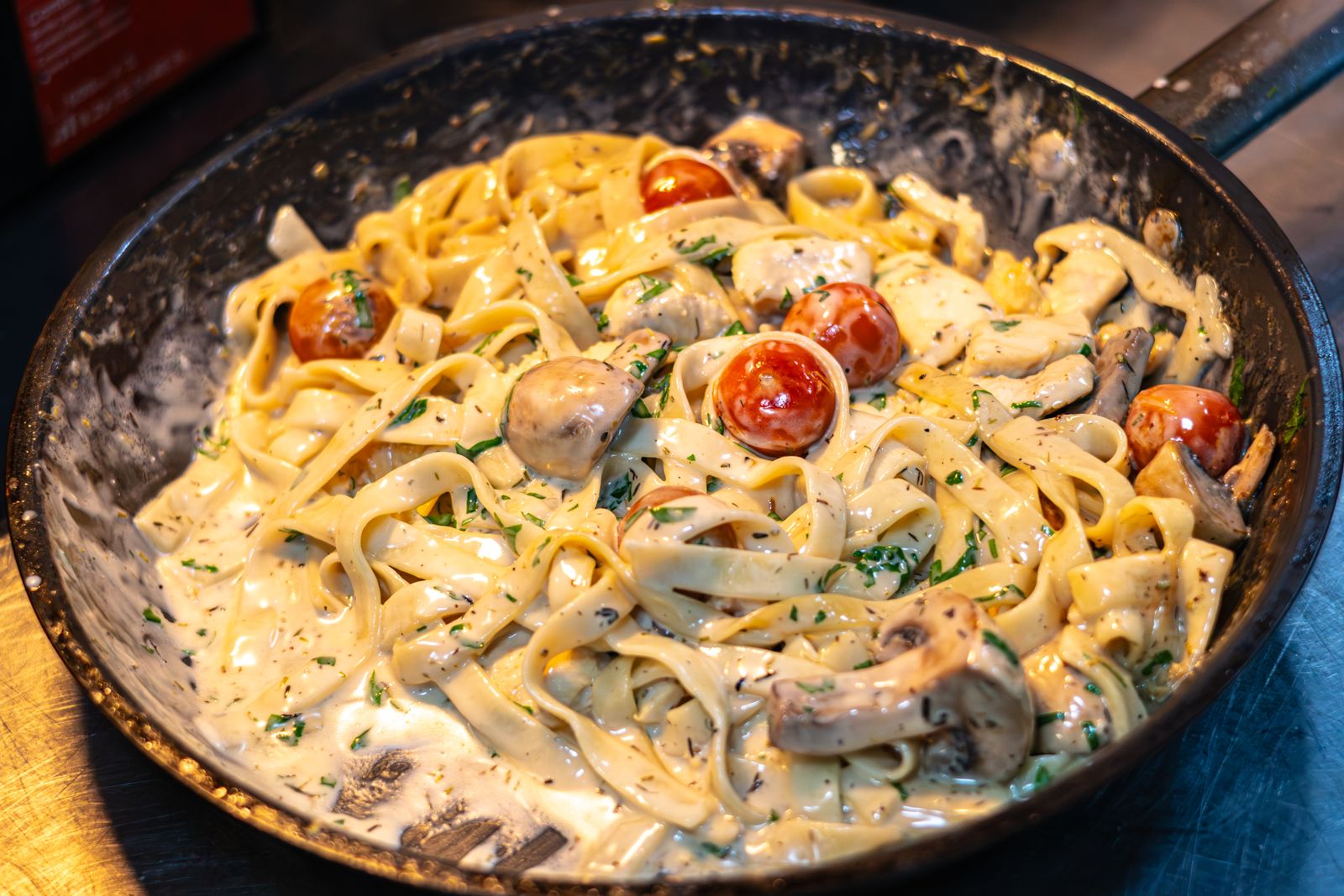 Creamy mushroom fettuccine in a skillet
