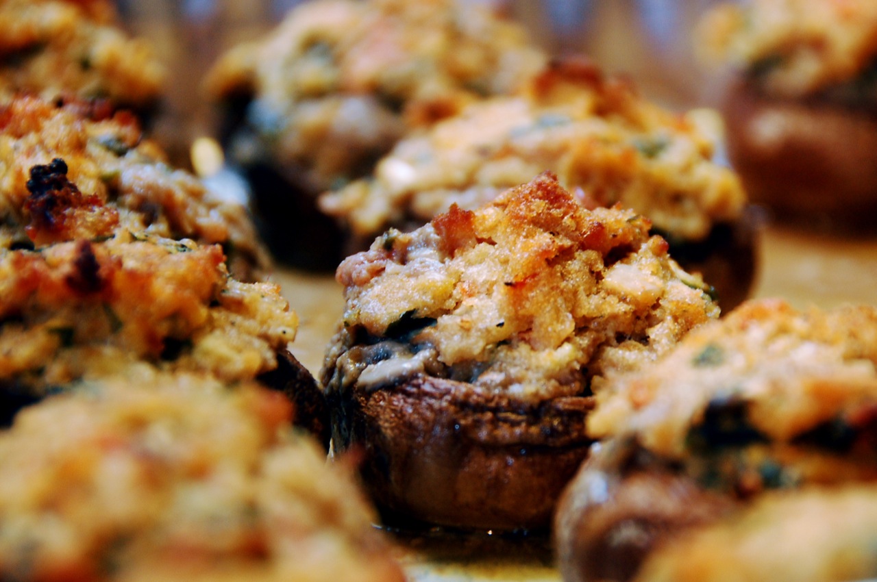 Golden herb and cheese stuffed mushrooms, warm holiday party food