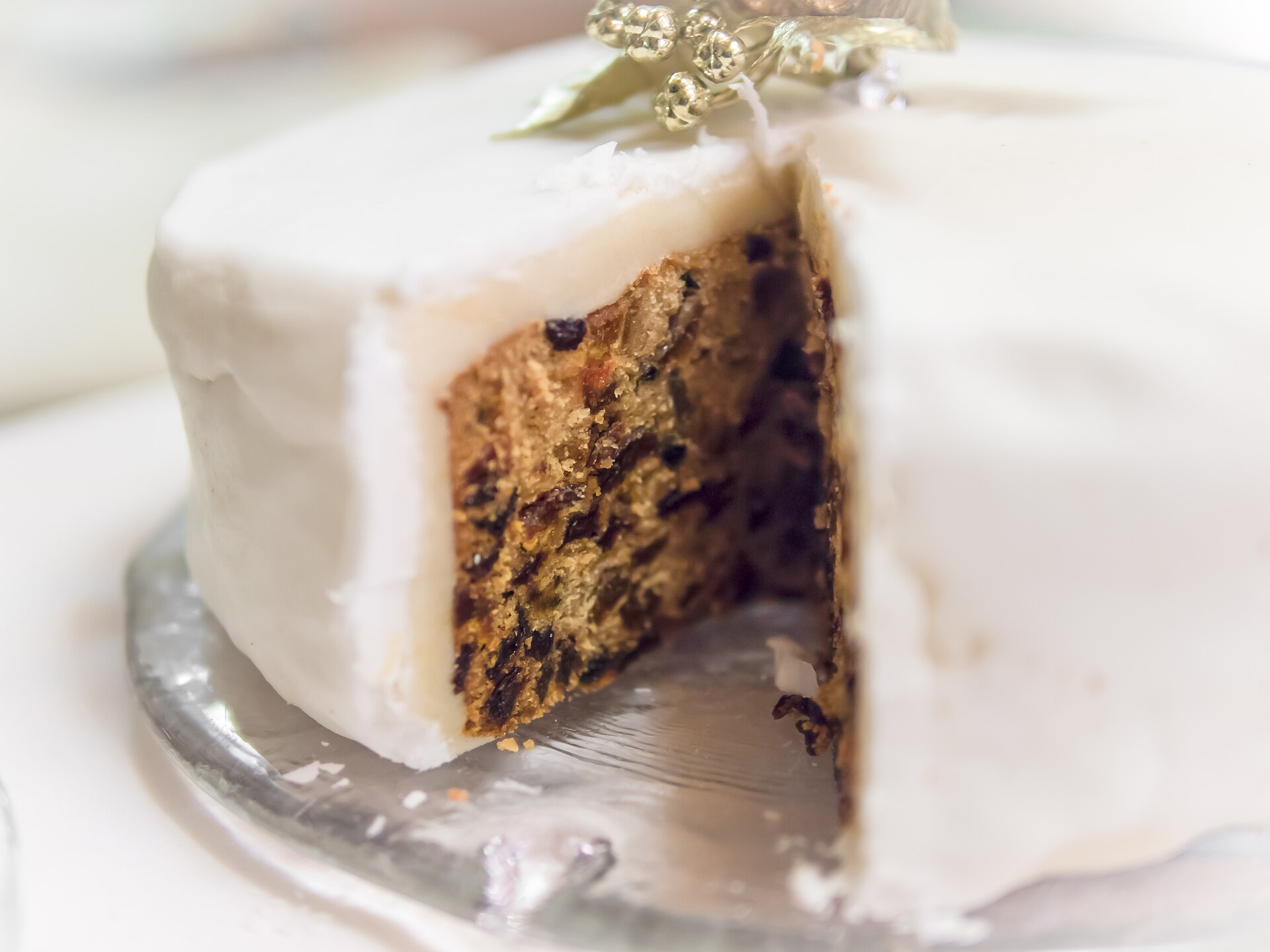 Iced fruit Christmas cake cut open, a Mary Berry Christmas classic
