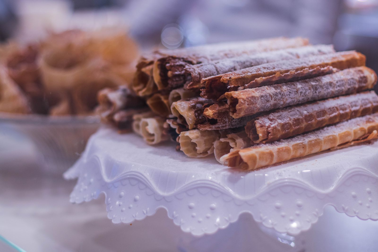 Crisp rolled lace snap biscuits on a plate