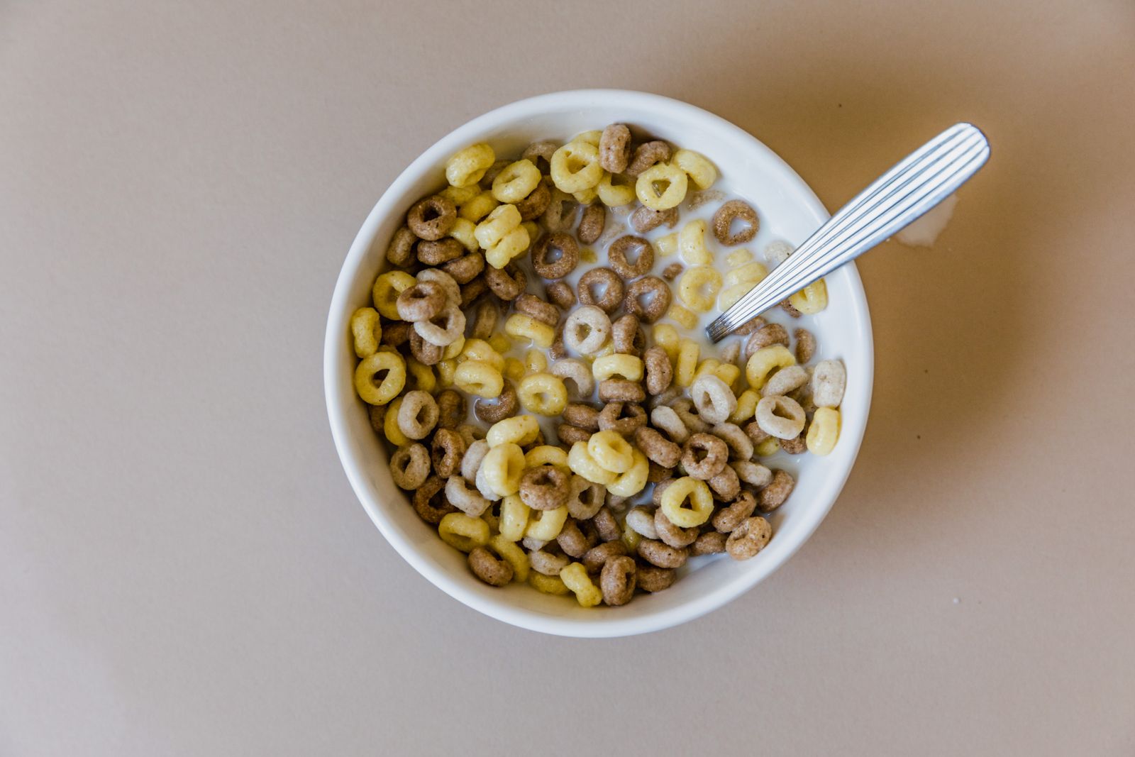 Bowl of crunchy homemade cereal with milk
