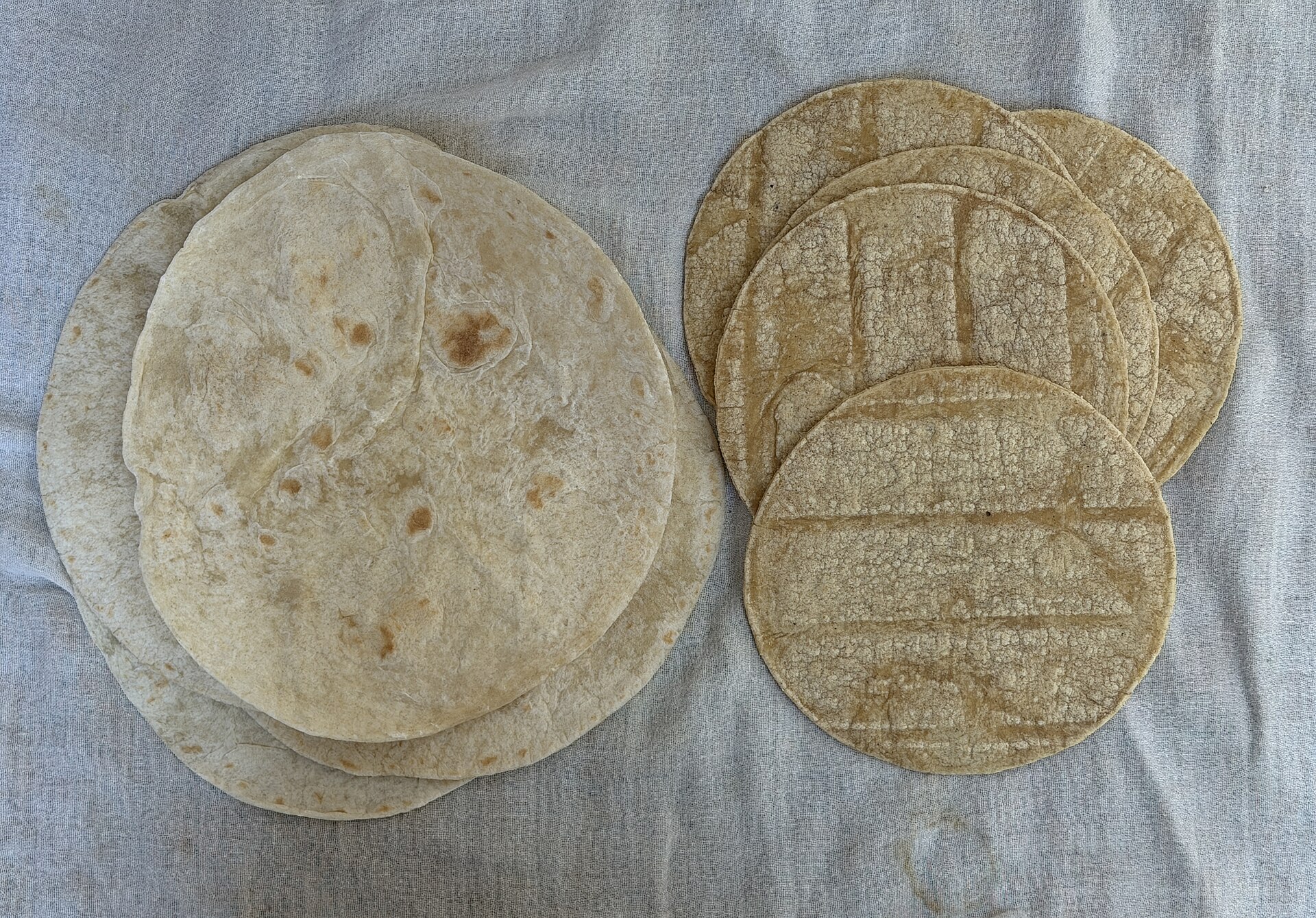 Stacks of soft homemade flour tortillas