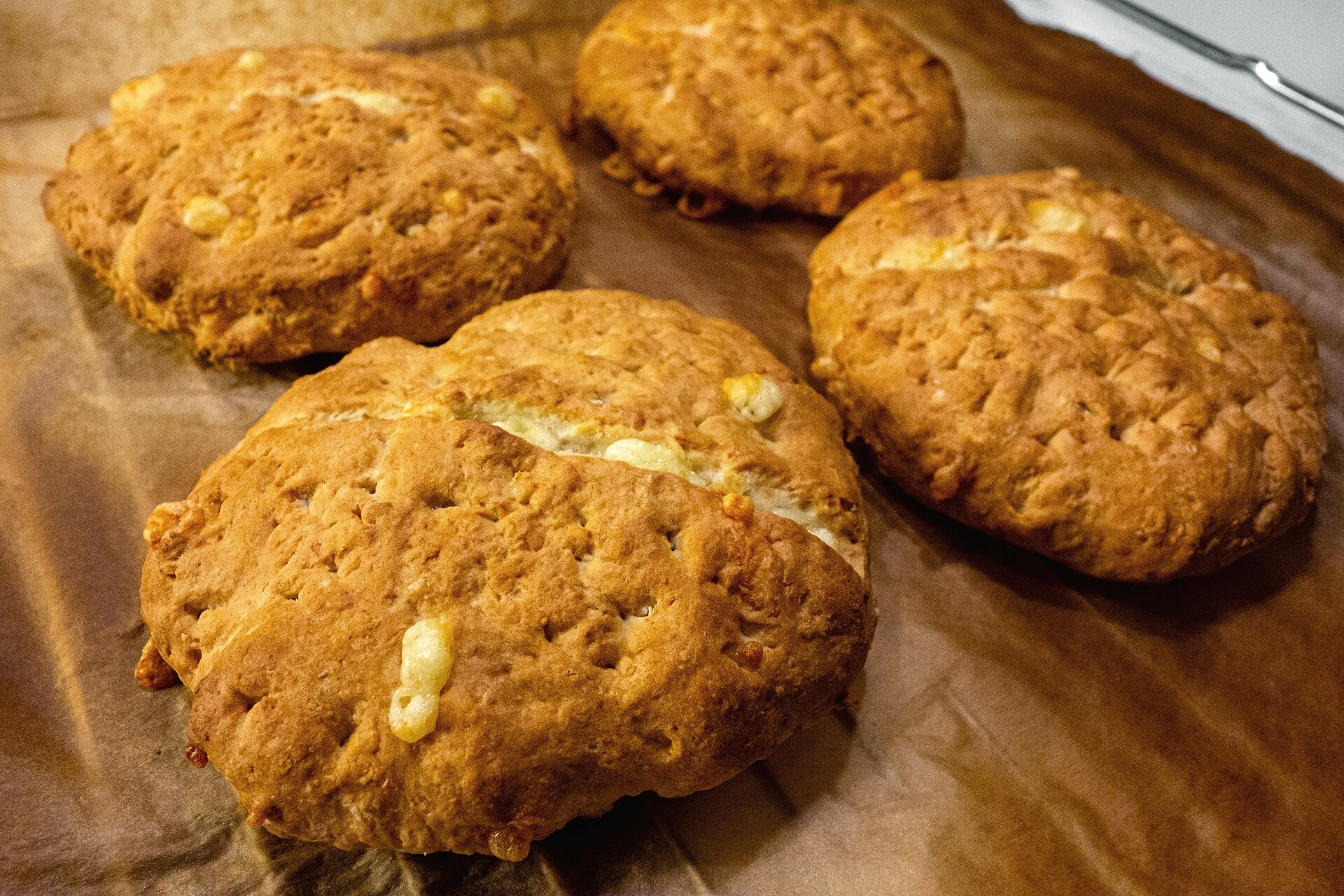 Golden cheese scones on a board