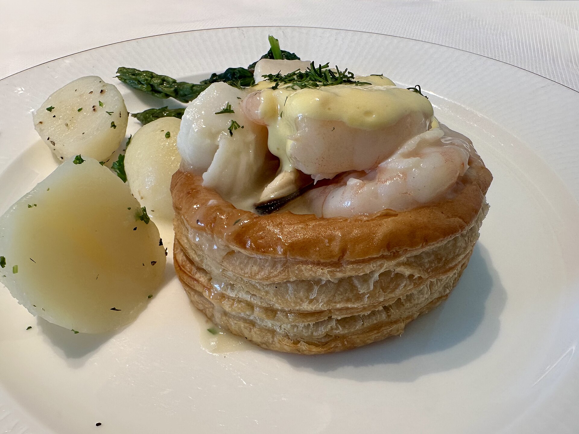 Puff pastry vol-au-vent case with a creamy filling