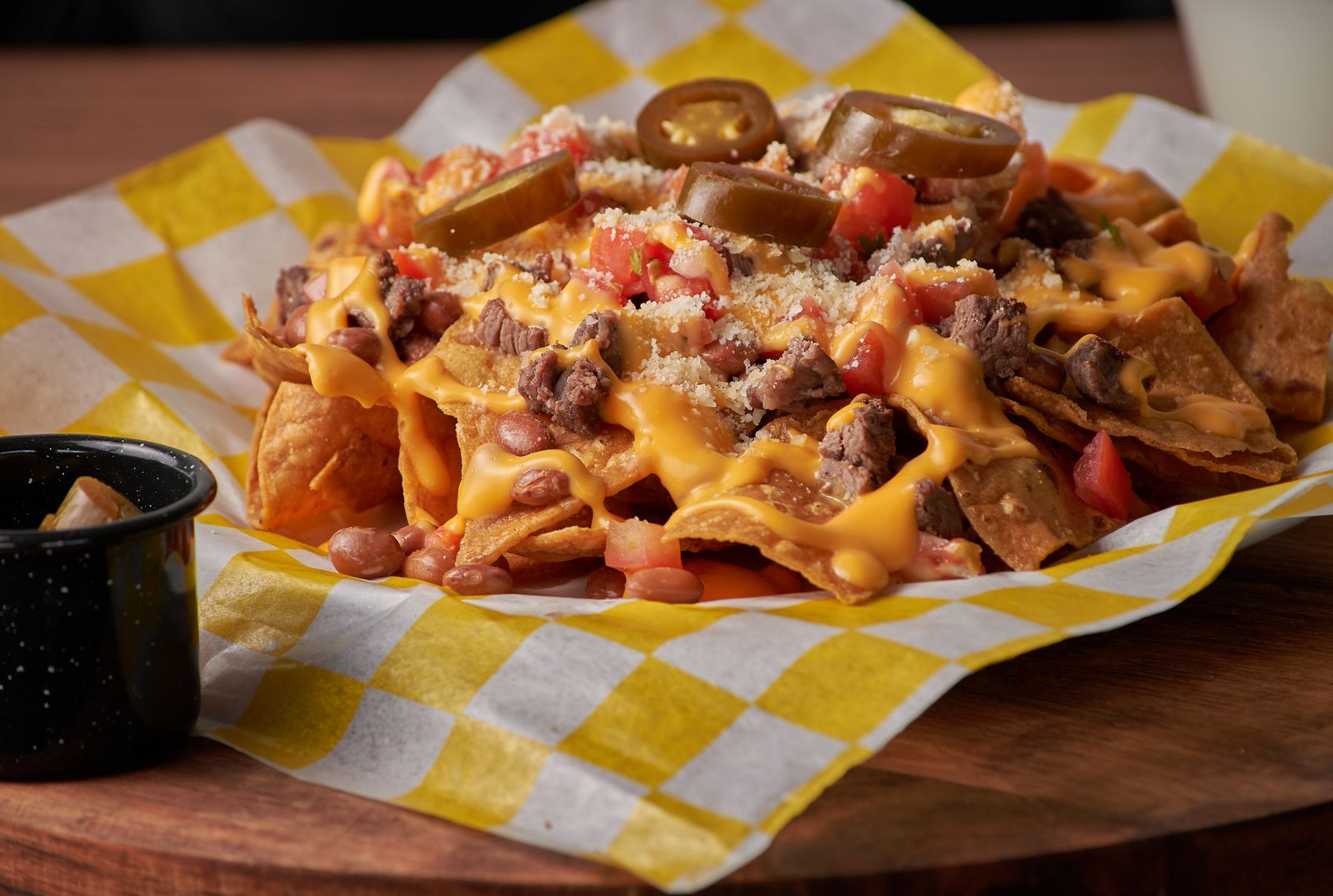 Classic sheet pan nachos with beef and melted cheese