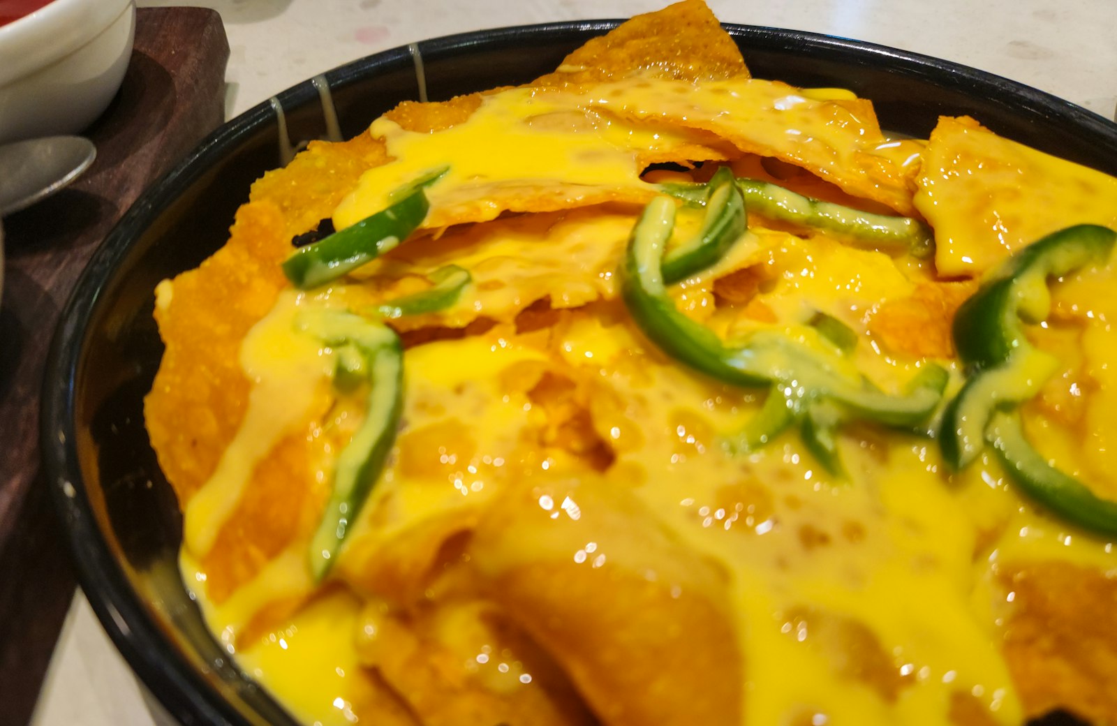 Chili cheese nachos smothered in melted cheese
