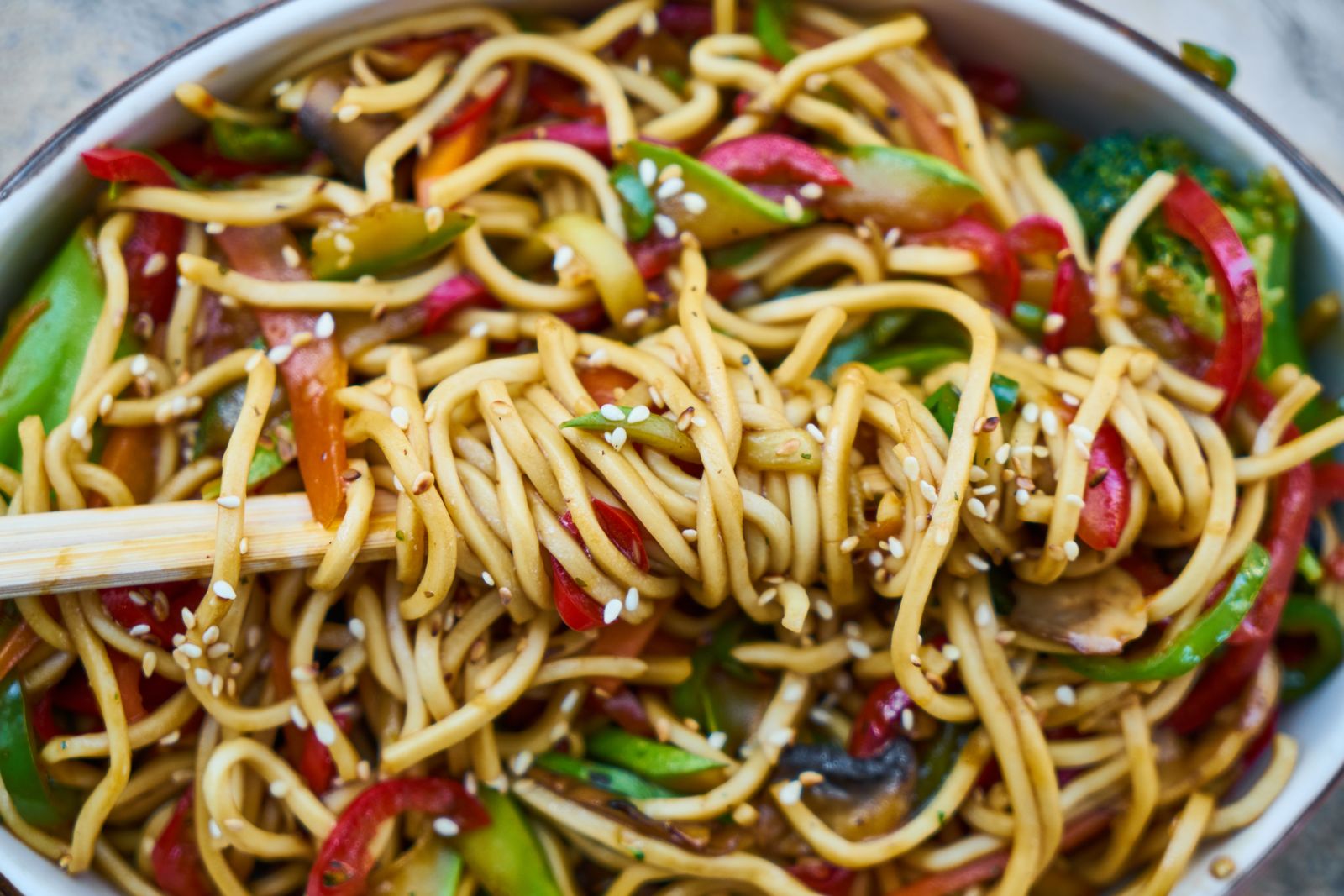 Cold noodle salad with cabbage, carrots and sesame seeds