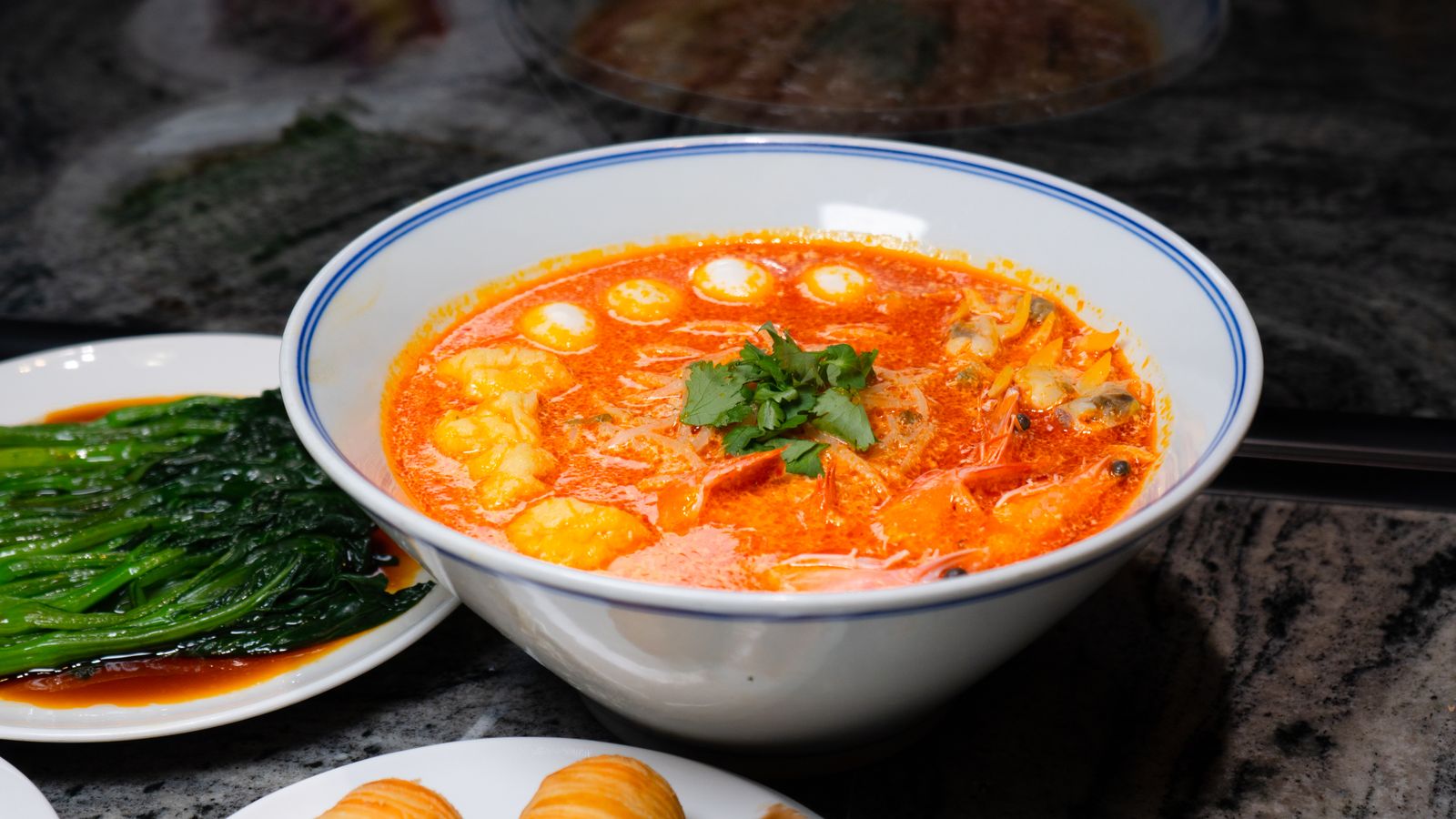 Creamy coconut curry soup with herbs