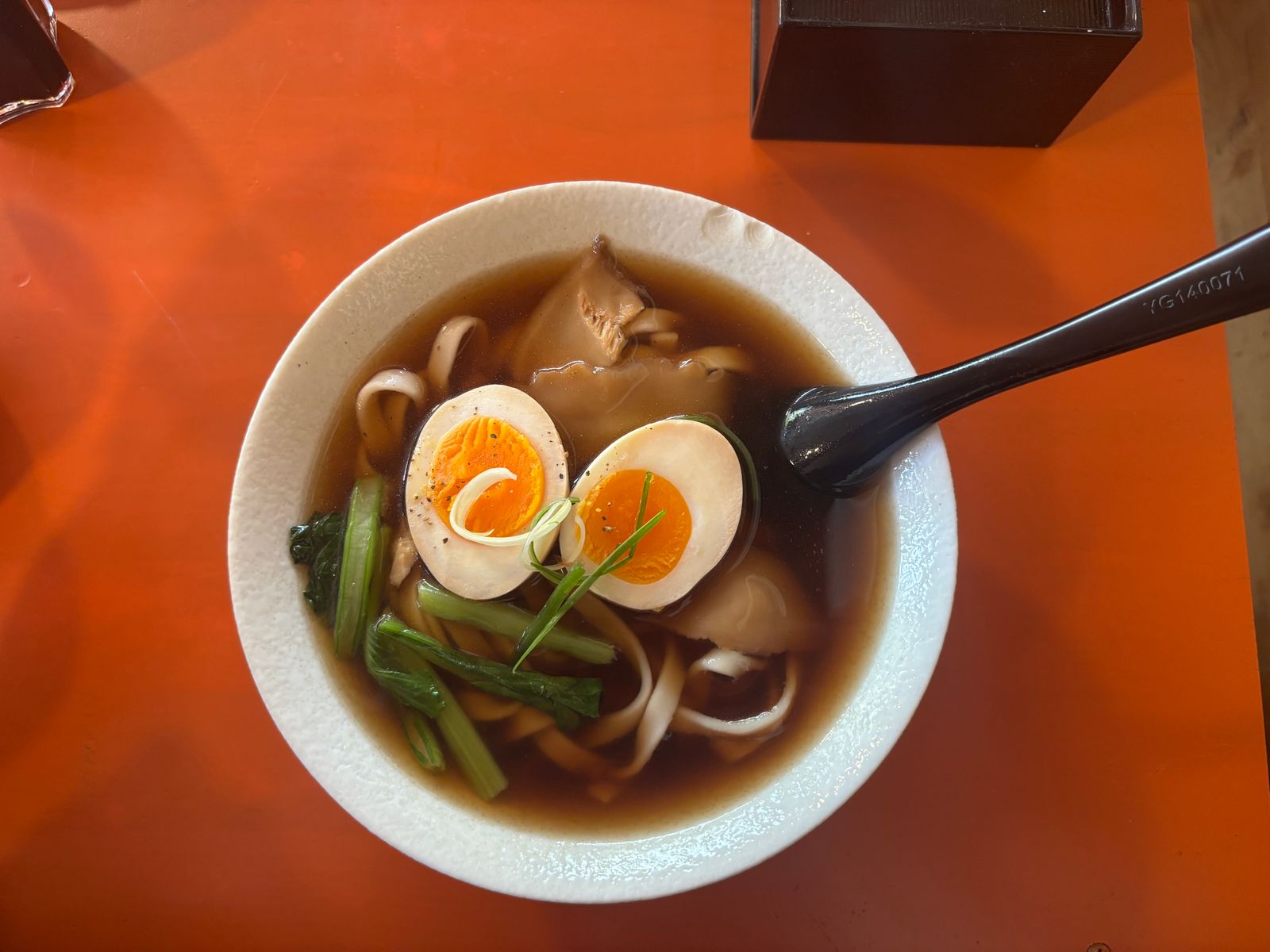 Halved jammy ramen eggs marinated in soy sauce