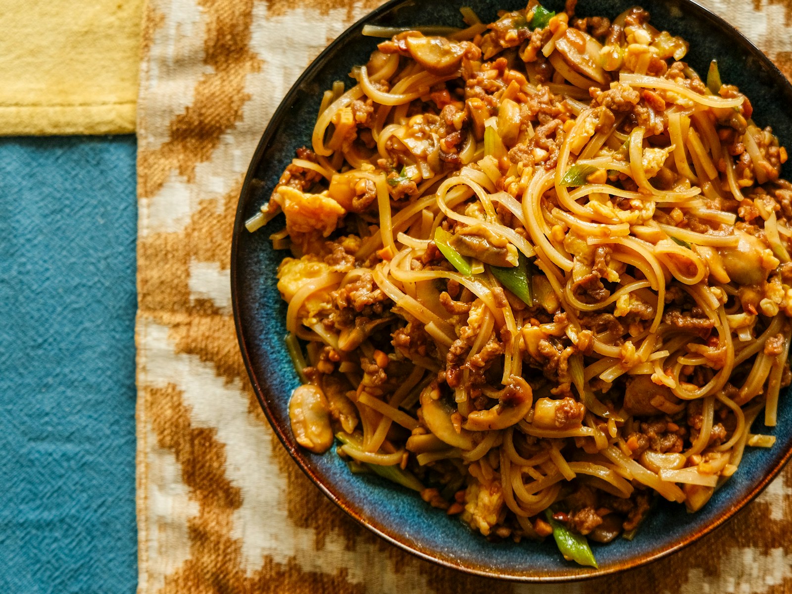 Glossy garlic butter noodles in a pan