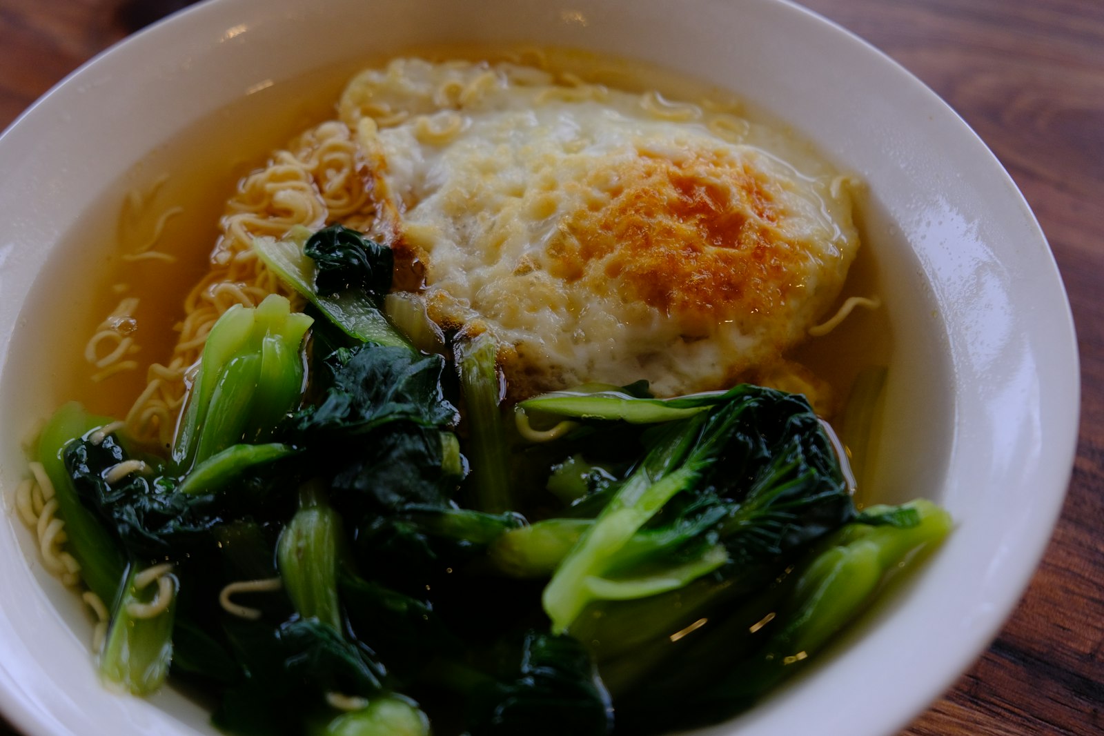 Ramen with greens and a soft egg