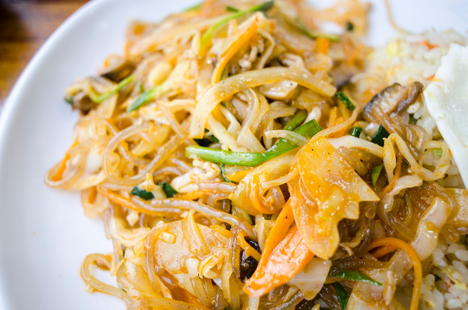 Ramen stir fry with mixed vegetables on a plate