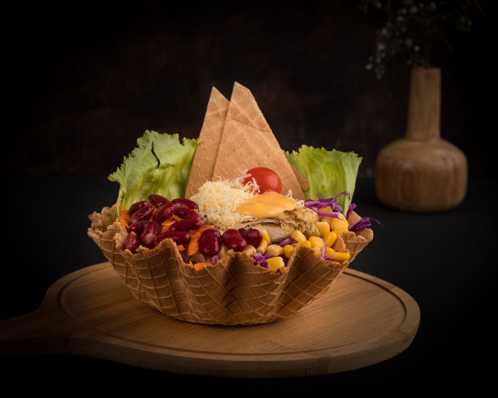 Crispy baked tortilla bowl filled with taco salad