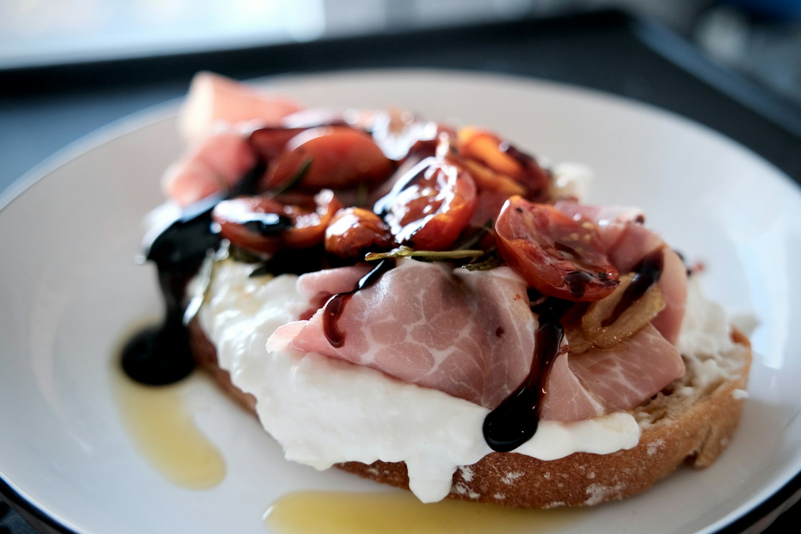 Toasted bread topped with ham and cheese