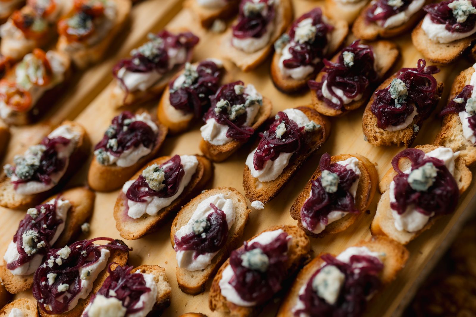 Crostini topped with caramelized onions