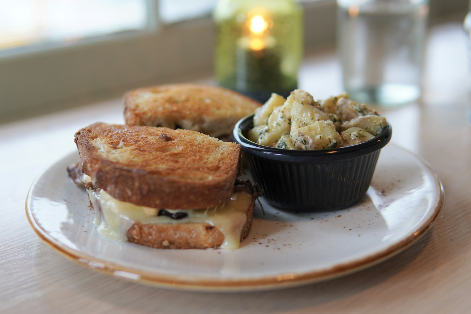 A grilled cheese sandwich on a plate