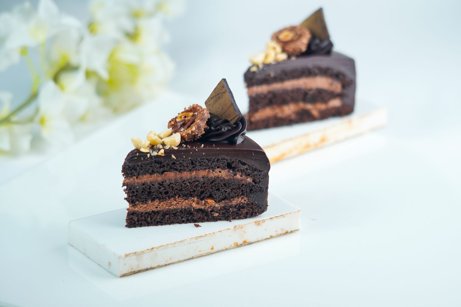 Slices of moist chocolate layer cake