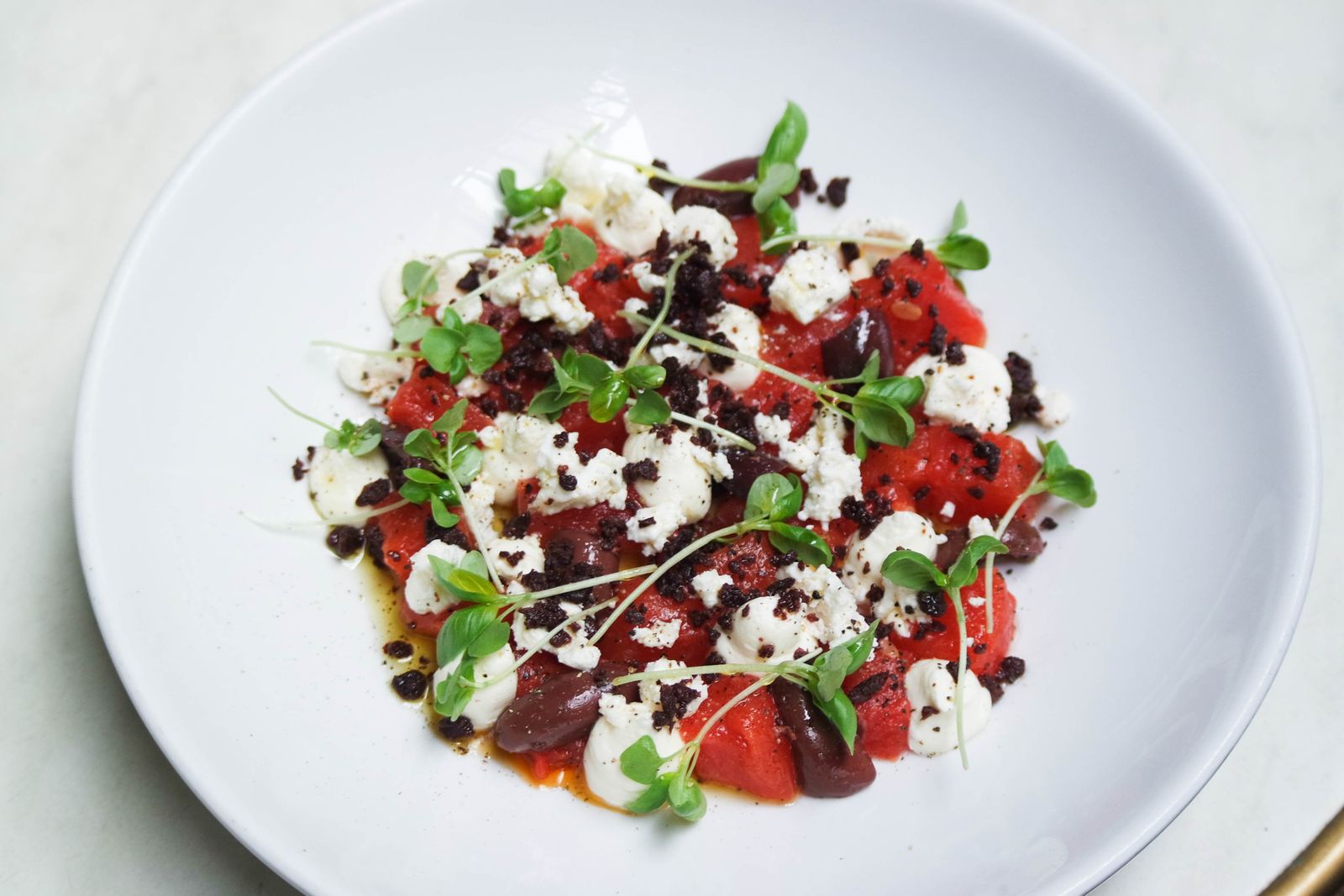 Watermelon salad with feta and mint, a classic of sweet and salty food combinations