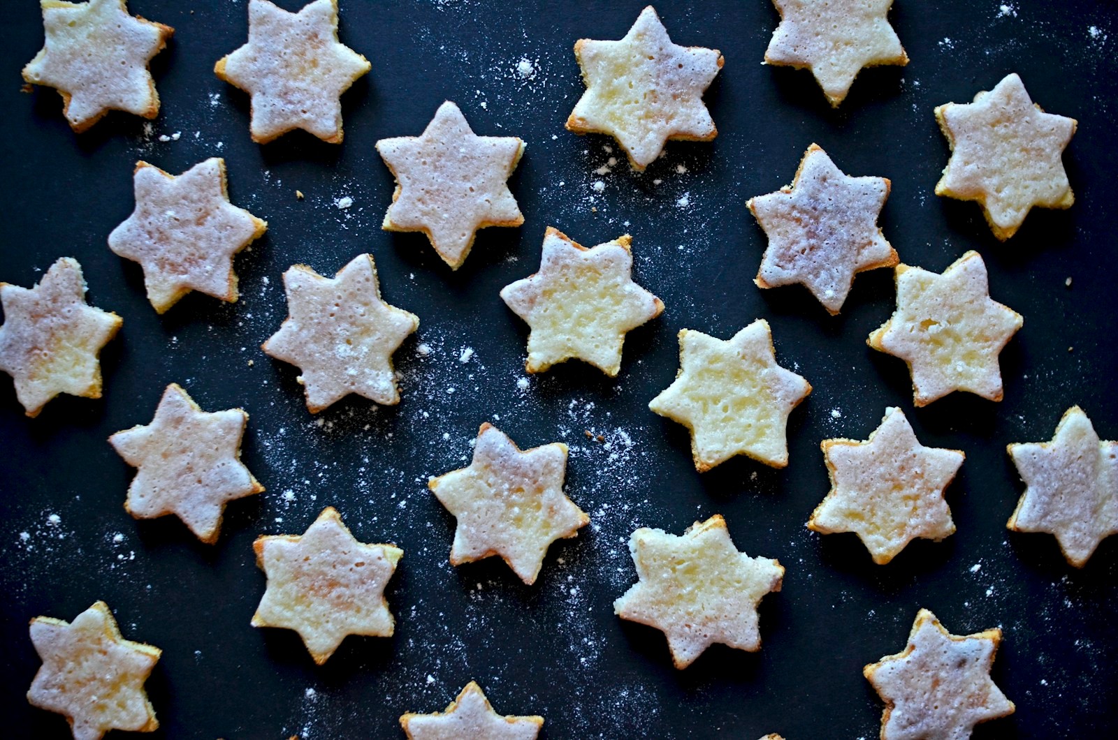 German cinnamon star cookies with white glaze