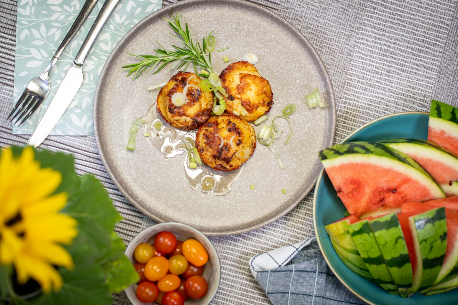 Golden fish cakes with salad on a plate