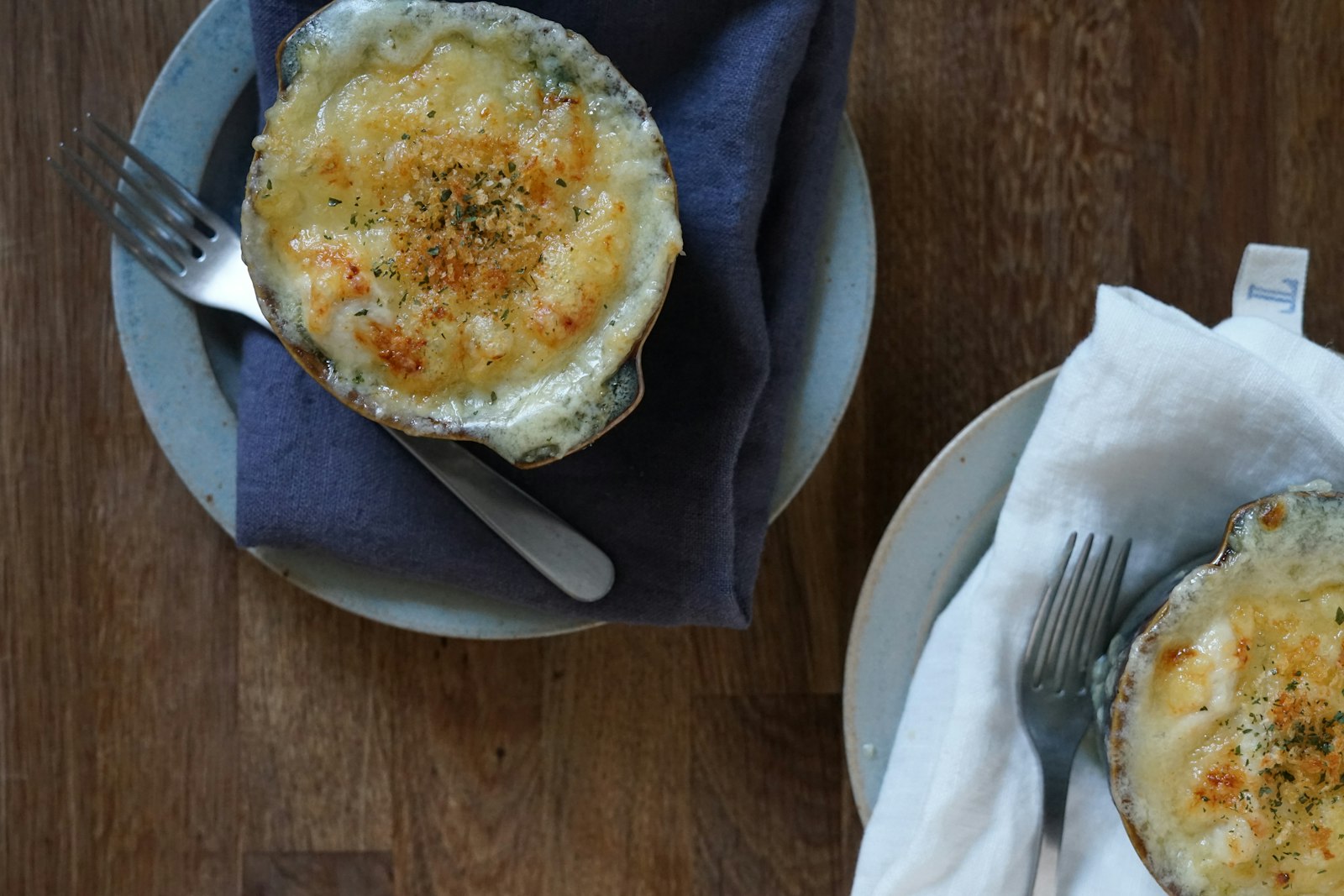 Cheesy baked smashed potatoes with a golden top