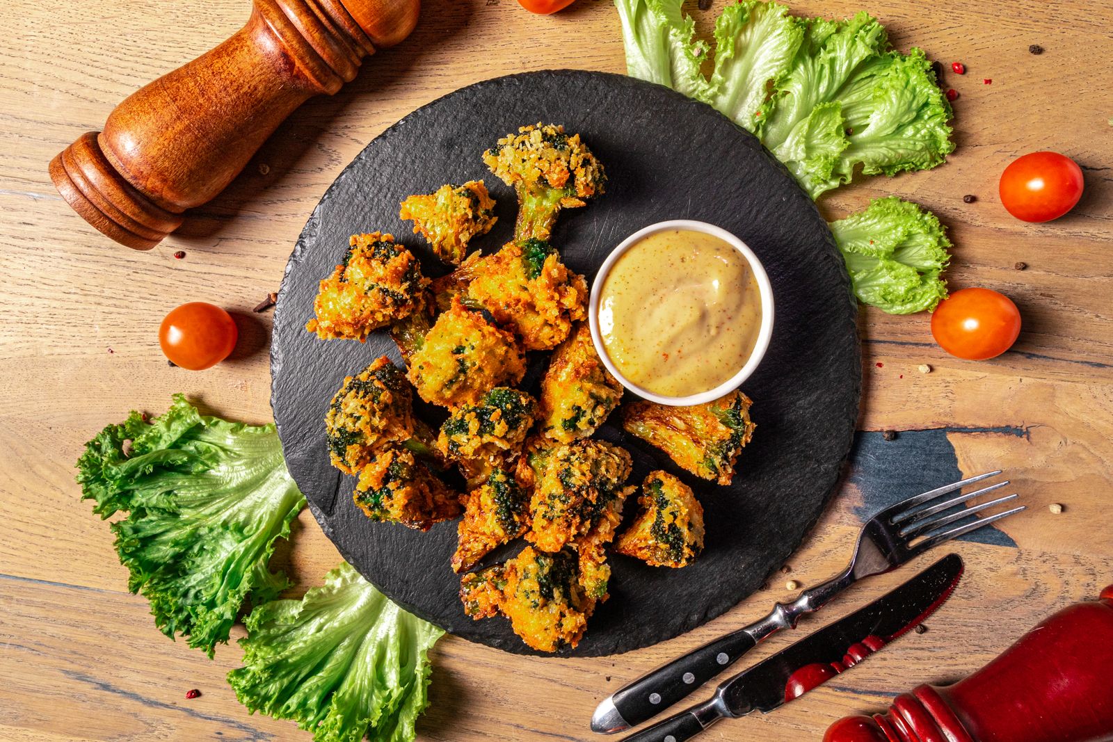 Crispy Parmesan broccoli bites with a dipping sauce