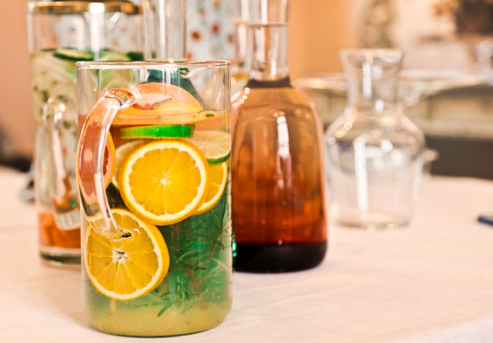 Pitchers of water infused with orange and lemon slices