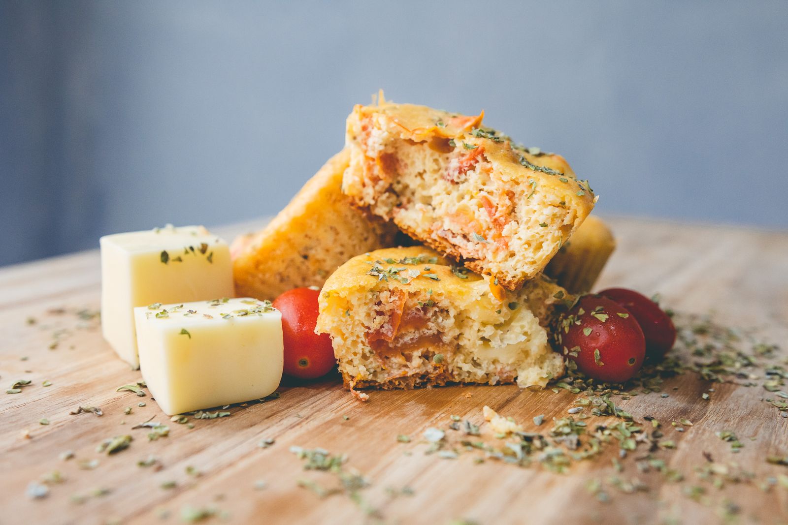 Ham and cheddar egg bites with tomato and herbs